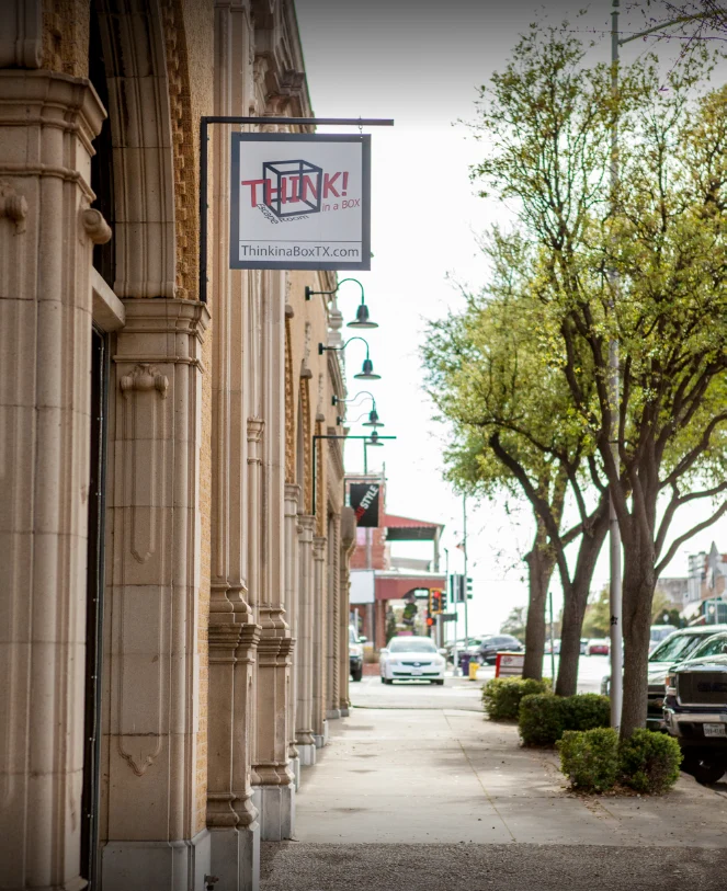 Exterior view of Think in a Box escape room in downtown San Angelo, ideal for visitors from Midland-Odessa or Abilene planning a day trip.