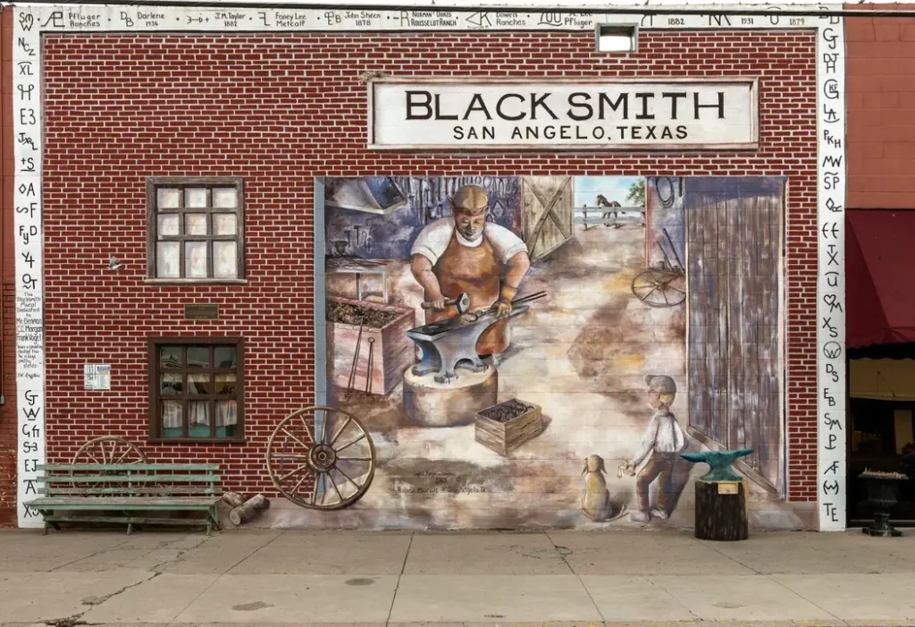 Mural depicting blacksmith in downtown San Angelo historic mural